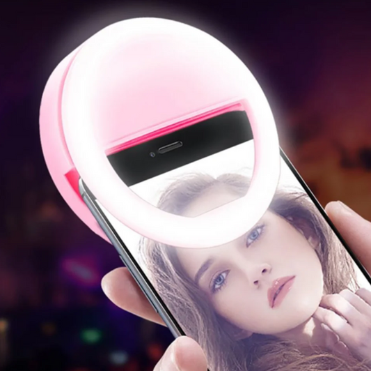 Clip-on LED phone selfie ring light brightening face for clearer selfies and video recording