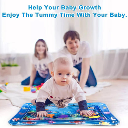 Baby playing on inflatable tummy time activity mat for sensory development