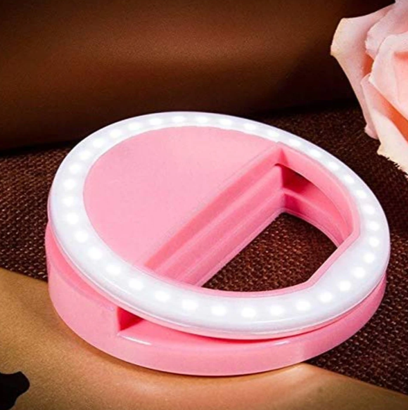 Pink clip-on LED phone selfie ring light with rechargeable battery for brighter selfies and video lighting