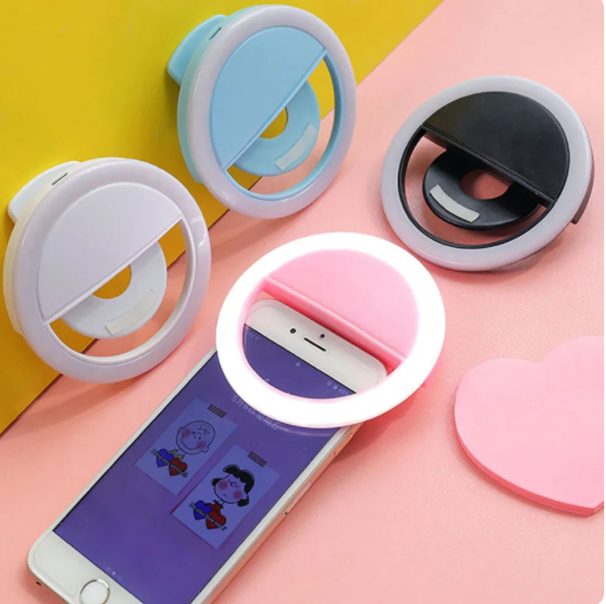 Mini clip-on selfie ring light available in multiple colors for smartphones